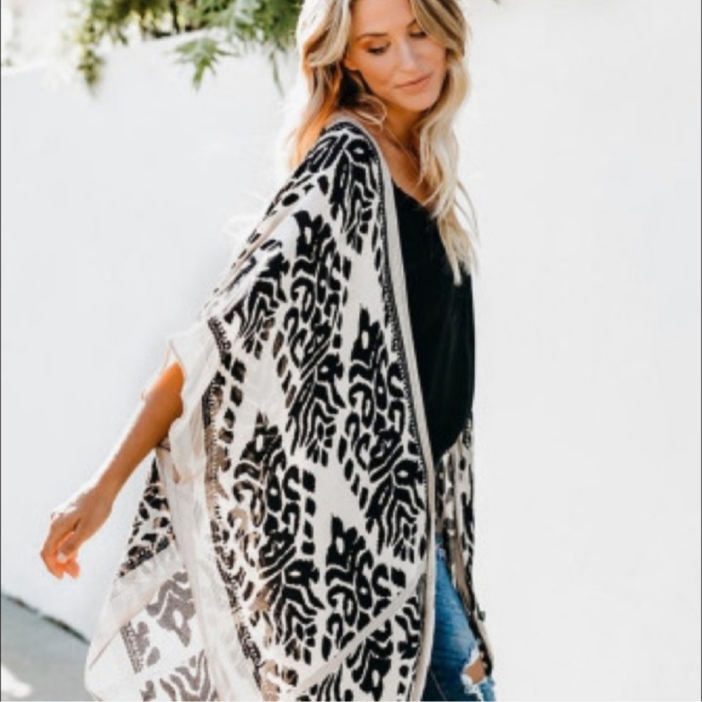 Vici Back in stock leopard kimono with pom poms